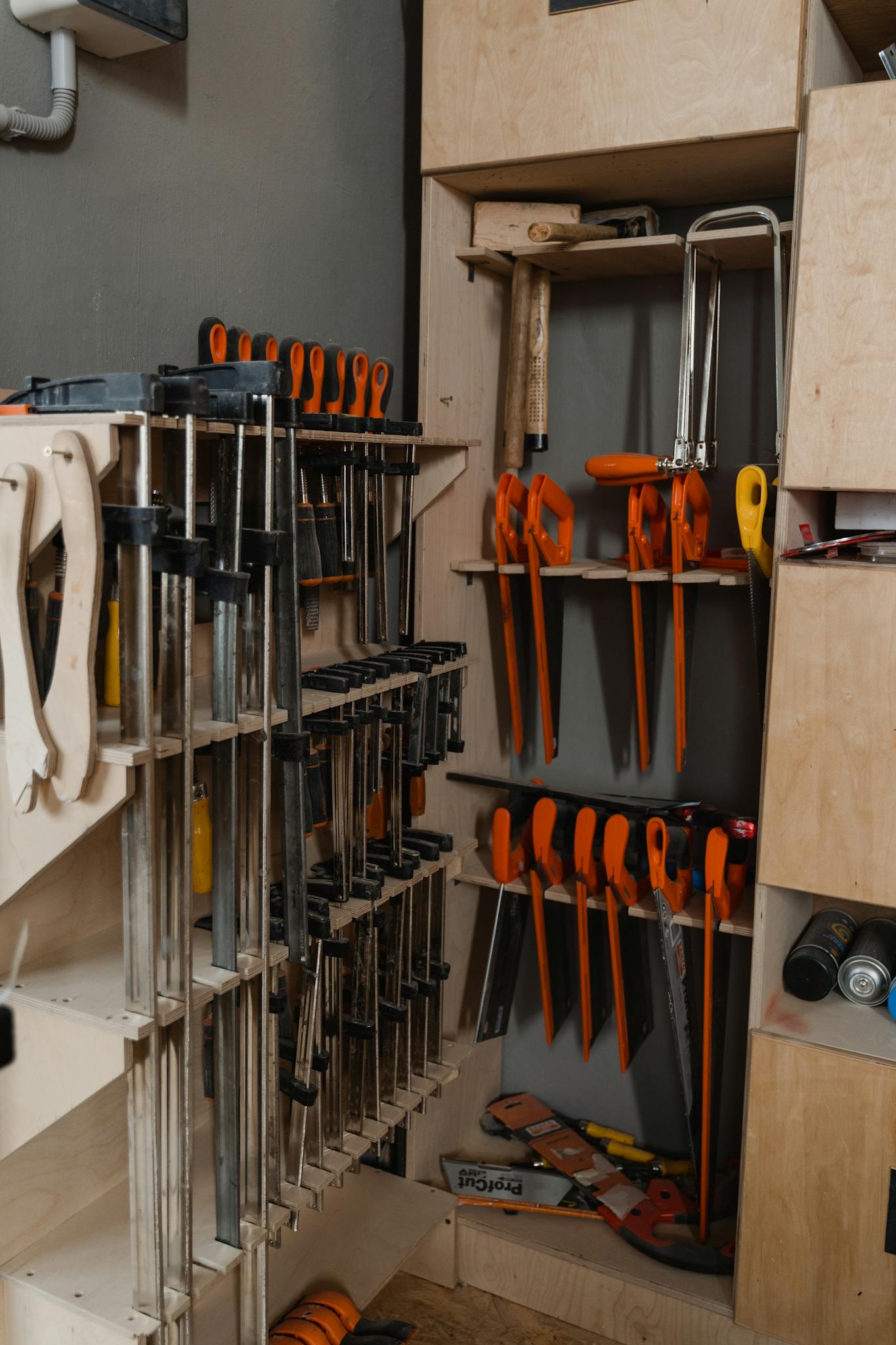A tidy display of woodworking tools in a workshop, showcasing precise organization.